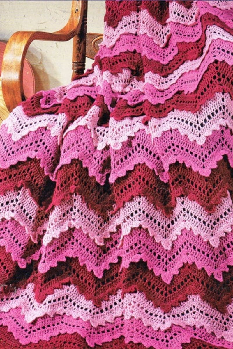 Pink and white rippled afghan