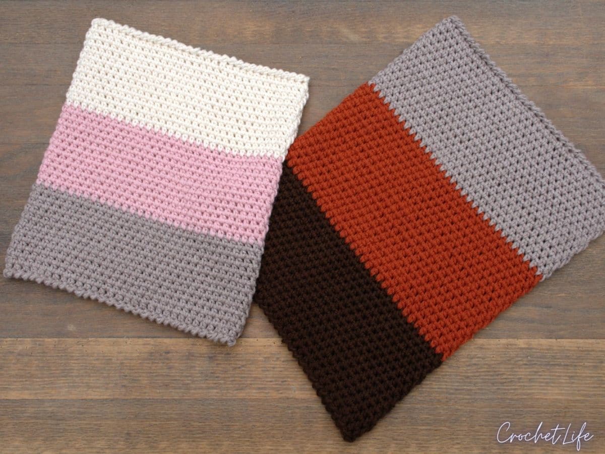 Two colorblock cowls on table