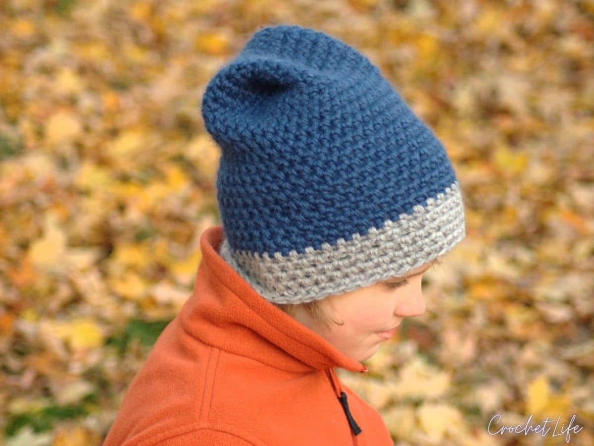 Boy in blue hat
