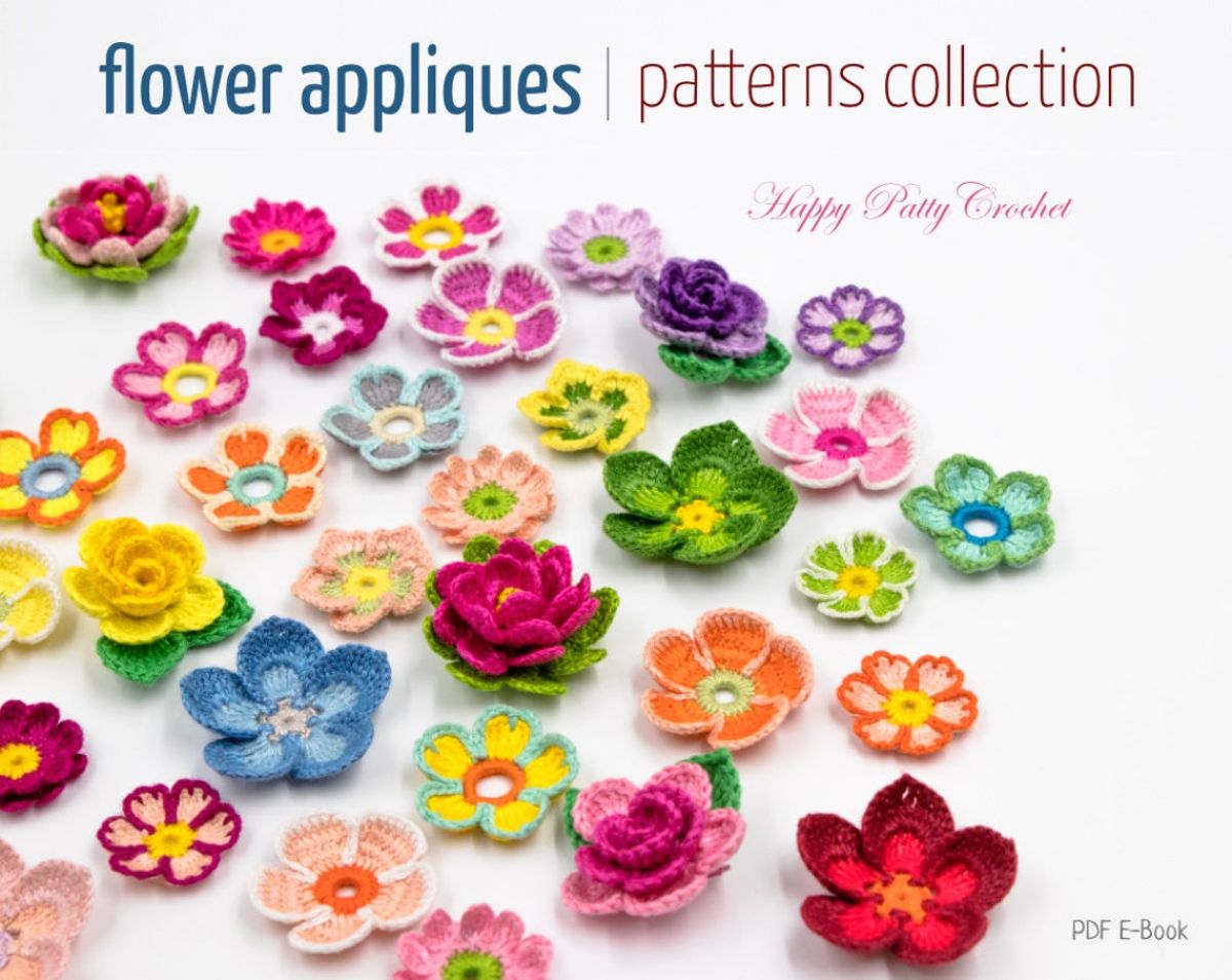 Multicolored crochet flowers scattered on a white background including roses, lotus flowers, and daisies.