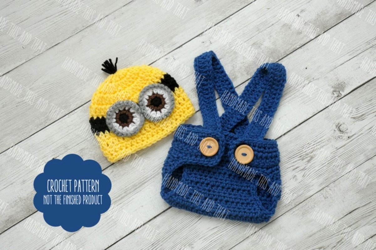 Newborn crochet minion outfit with yellow beanie hat with white and black eyes and spikes on top and blue dungarees.