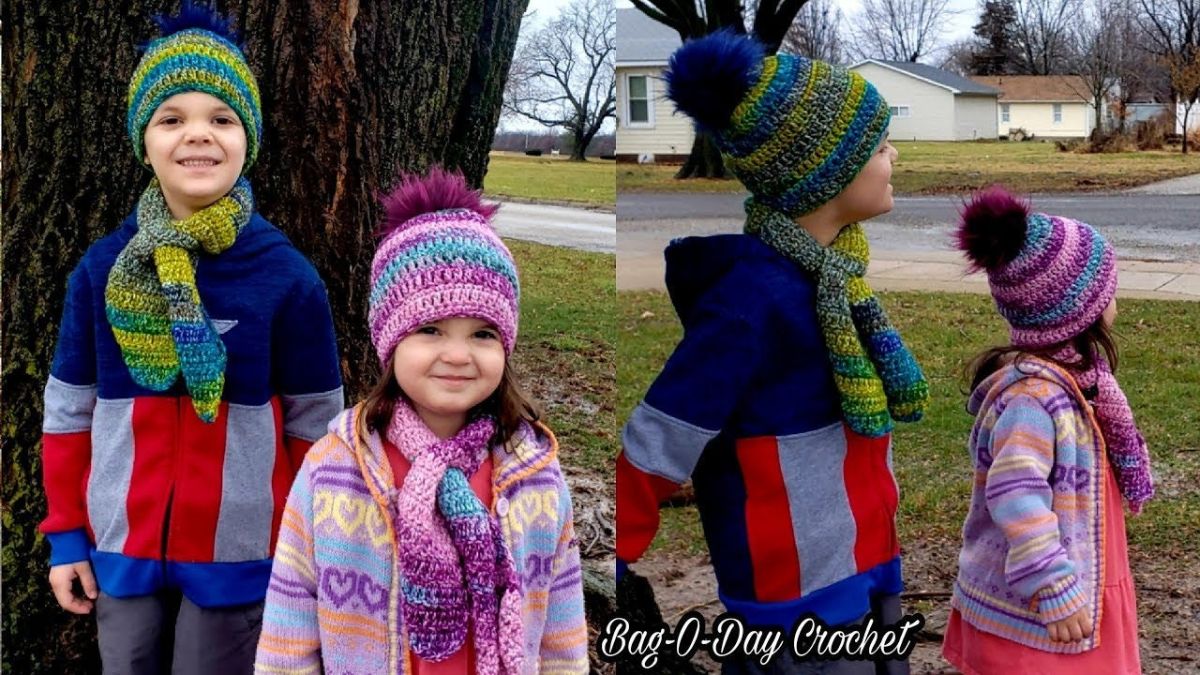Young boy wearing green crochet beanie and matching scarf with girl wearing pink, purple, and blue striped crochet hat and scarf.