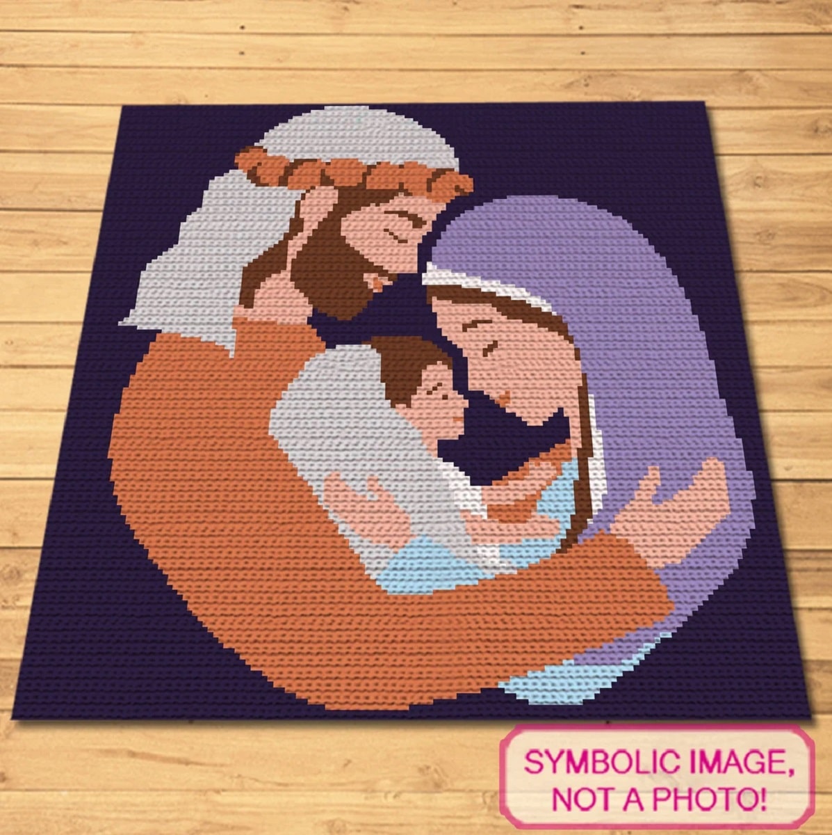 A large crochet wall hanging of Joseph and Mary with a small baby Jesus in the middle of their arms.