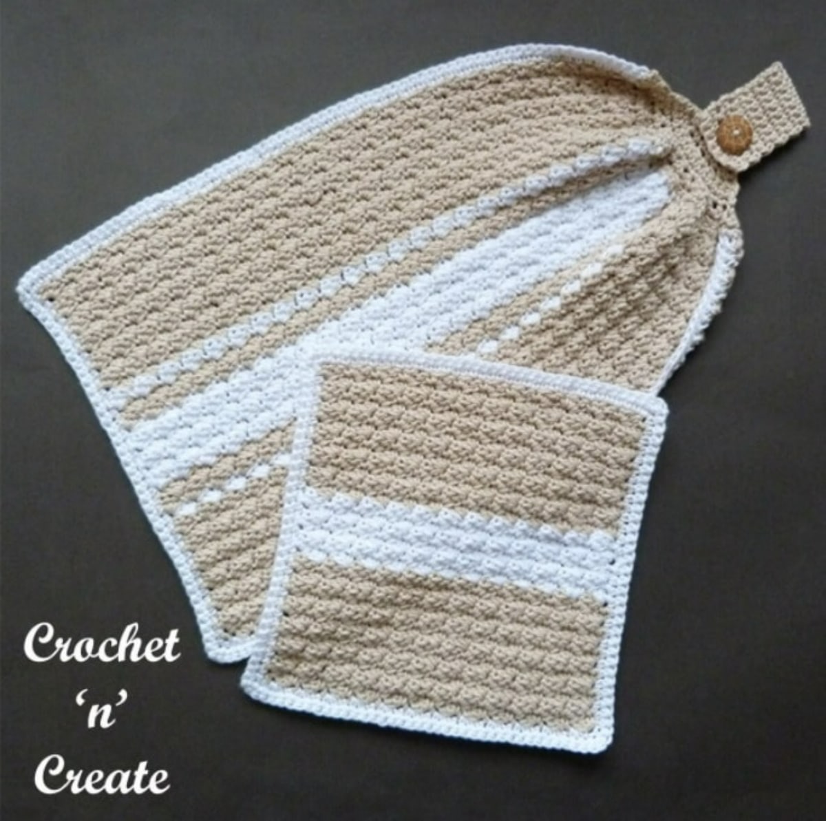White and light brown striped hand towel with a button and loop at the top to secure it next to a small brown and white striped cloth.