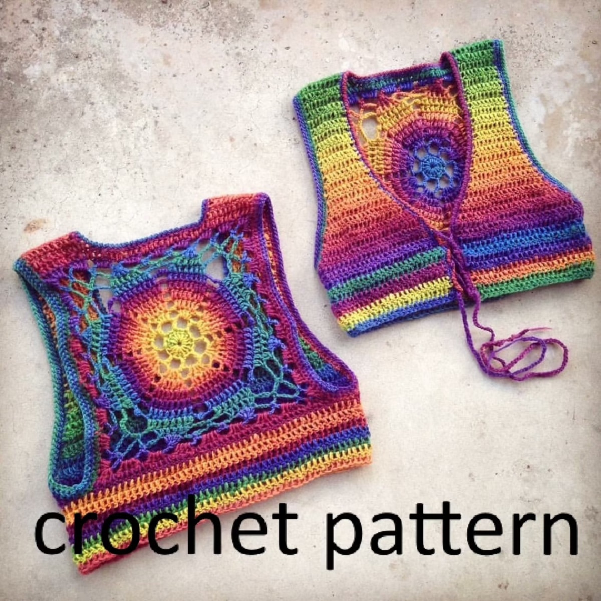 A brightly colored cropped vest with a mandala on the back next to the front of the vest with pink string to fasten it.