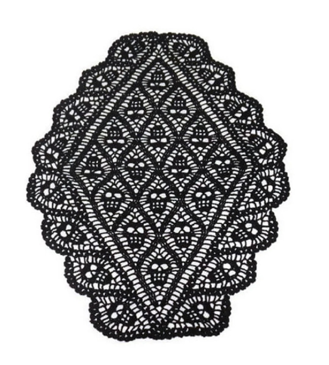 Large black crochet doily with diamond design and skulls stitched into it on a plain white background.