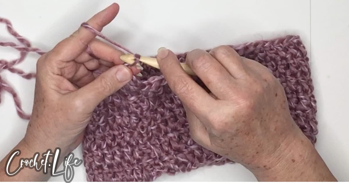 crocheting the cowl portion of the ruffled hooded cowl crochet pattern