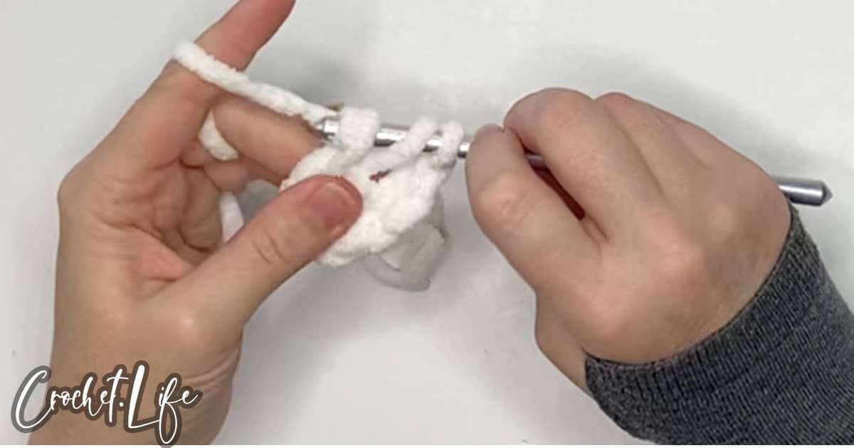 in-process step of how to crochet a snowball